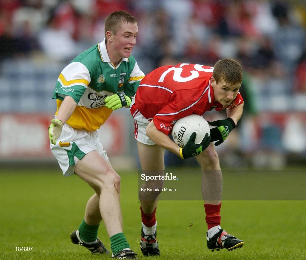 30 July 2005; David Gould, Cork is tackled by Rory Connor, Offaly. All-Ireland Minor Football Championship Quarter Final, Cork v Offaly, O'Moore Park, Portlaoise, Co. Laois. Picture credit; Brendan Moran / SPORTSFILE