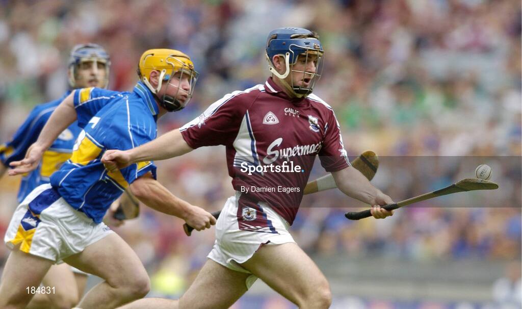 31 July 2005; David Forde, Galway is tackled by Eamonn Corcoran, Tipperary. Guinness All-Ireland Hurling Championship, Quarter-Final, Galway v Tipperary, Croke Park, Dublin. Picture credit; Damien Eagers / SPORTSFILE