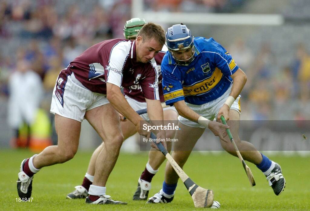 31 July 2005; Derick Hardiman, Galway, in action against Benny Dunne, Tipperary. Guinness All Ireland Hurling Championship, Quarter Final, Galway v Tipperary, Croke Park, Dublin. Picture credit; Brendan Moran / SPORTSFILE