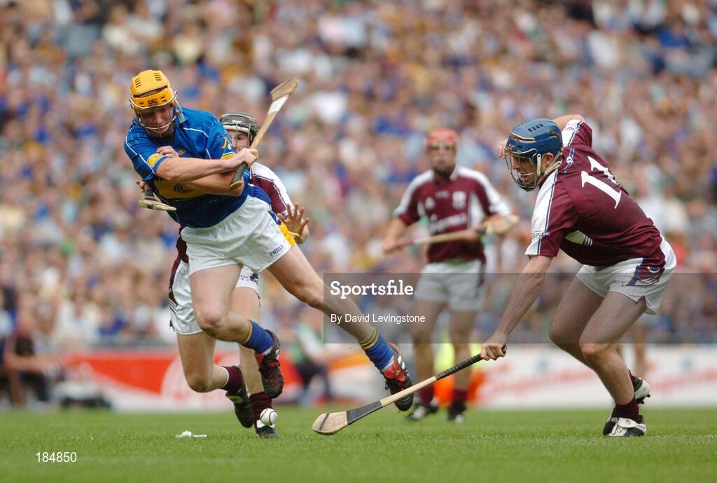 31 July 2005; Eamonn Corcoran, Tipperary is tackled by David Forde, Galway. Guinness All-Ireland Hurling Championship, Quarter-Final, Galway v Tipperary, Croke Park, Dublin. Picture credit; David Levingstone / SPORTSFILE