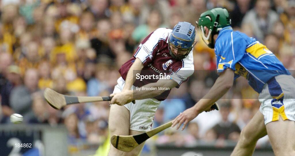 31 July 2005; Damien Hayes, Galway, scores his sides second goal despite the challenge of Declan Fanning, Tipperary. Guinness All-Ireland Hurling Championship, Quarter-Final, Galway v Tipperary, Croke Park, Dublin. Picture credit; Brendan Moran / SPORTSFILE