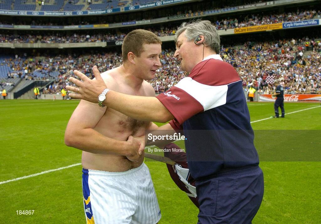 31 July 2005; Galway manager Conor Hayes with Tipperary's John Carroll after the game. Guinness All-Ireland Hurling Championship, Quarter-Final, Galway v Tipperary, Croke Park, Dublin. Picture credit; Brendan Moran / SPORTSFILE