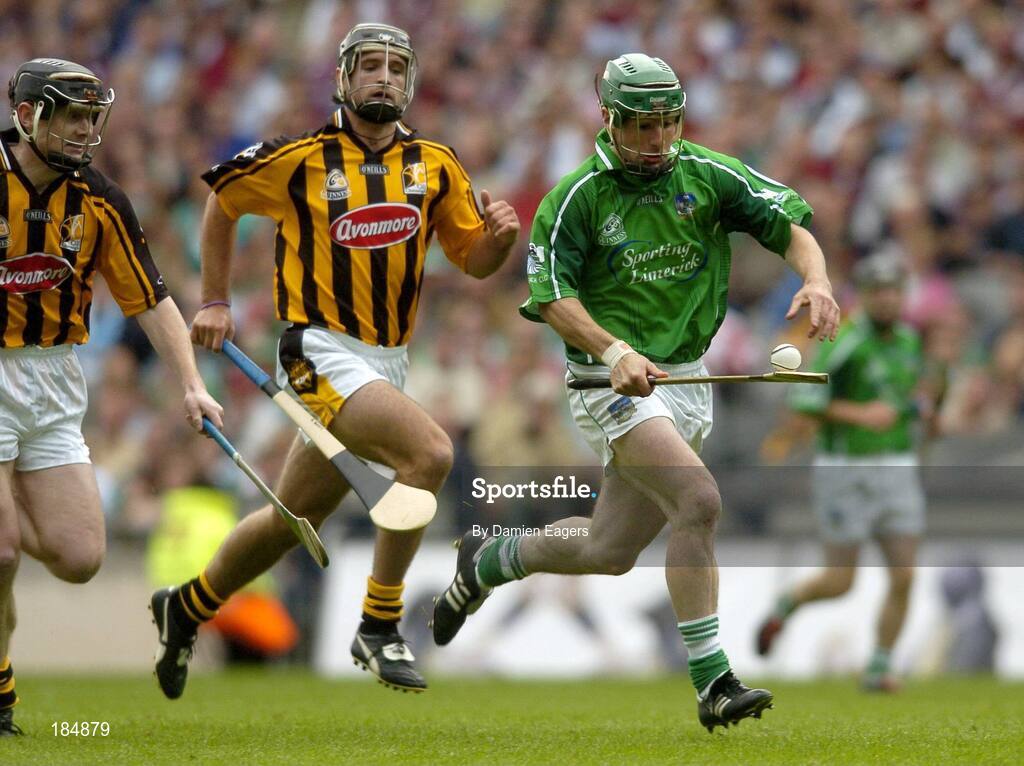 31 July 2005; Stephen O'Shaughnessy, Limerick, races away from Bryan Barry and Peter Barry, left, Kilkenny. Guinness All-Ireland Hurling Championship, Quarter-Final, Kilkenny v Limerick, Croke Park, Dublin. Picture credit; Damien Eagers / SPORTSFILE