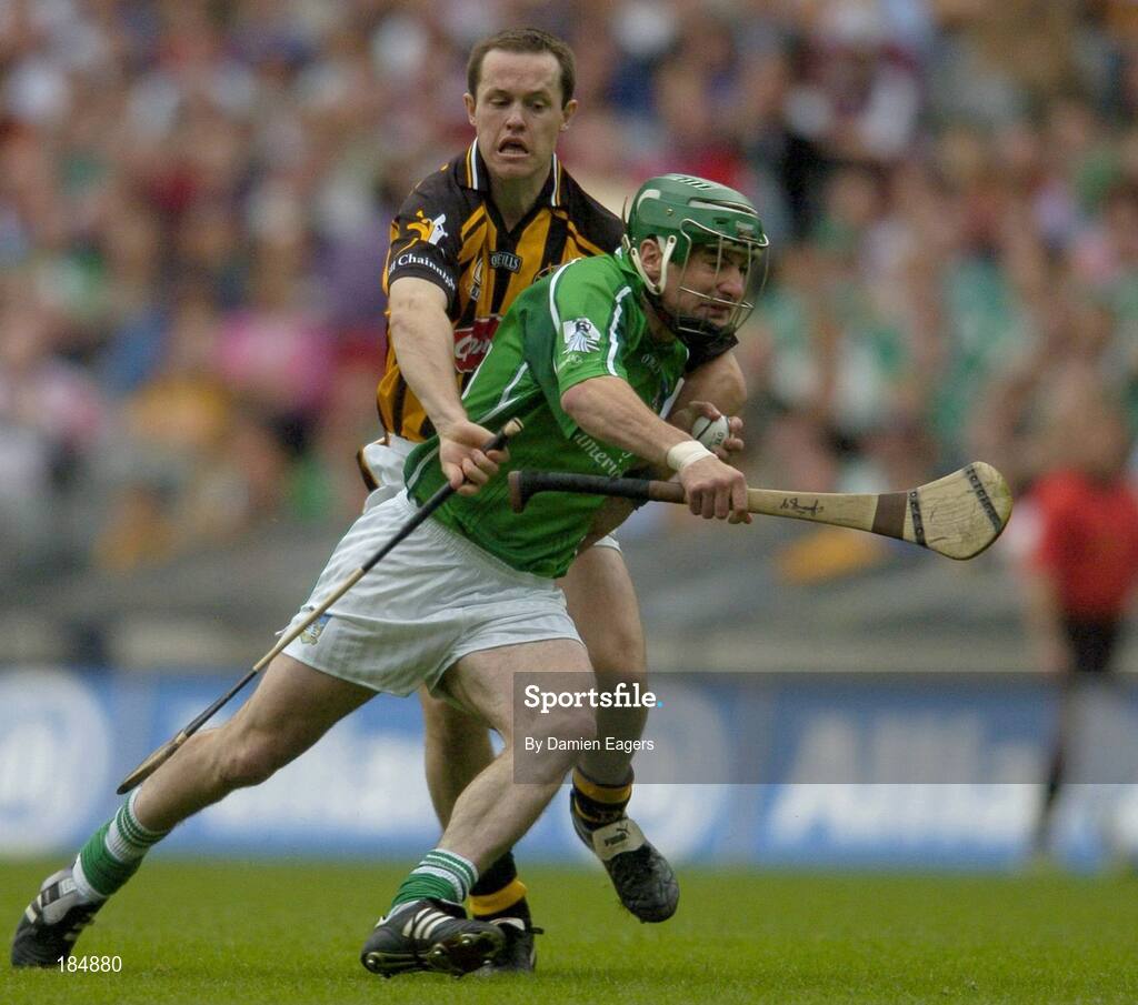 31 July 2005; Stephen O'Shaughnessy, Limerick, is tackled by Michael Kavanagh, Kilkenny. Guinness All-Ireland Hurling Championship, Quarter-Final, Kilkenny v Limerick, Croke Park, Dublin. Picture credit; Damien Eagers / SPORTSFILE