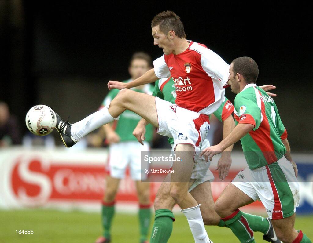 31 July 2005; Keith Dunne, St Patrick's Athletic, in action against Greg O'Halloran, Cork City. eircom League, Premier Division, St Patrick's Athletic v Cork City, Richmond Park, Dublin. Picture credit; Matt Browne / SPORTSFILE
