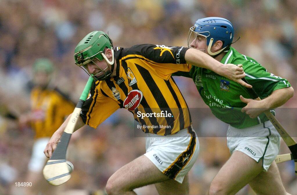31 July 2005; Eoin Larkin, Kilkenny, is dispossessed by Brian Geary, Limerick. Guinness All-Ireland Hurling Championship, Quarter-Final, Kilkenny v Limerick, Croke Park, Dublin. Picture credit; Brendan Moran / SPORTSFILE