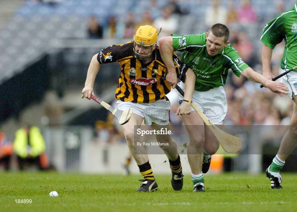 31 July 2005; Richie Power, Kilkenny, is tackled by Mark Foley, Limerick. Guinness All-Ireland Senior Hurling Championship Quarter-Final, Kilkenny v Limerick, Croke Park, Dublin. Picture credit; Ray McManus / SPORTSFILE