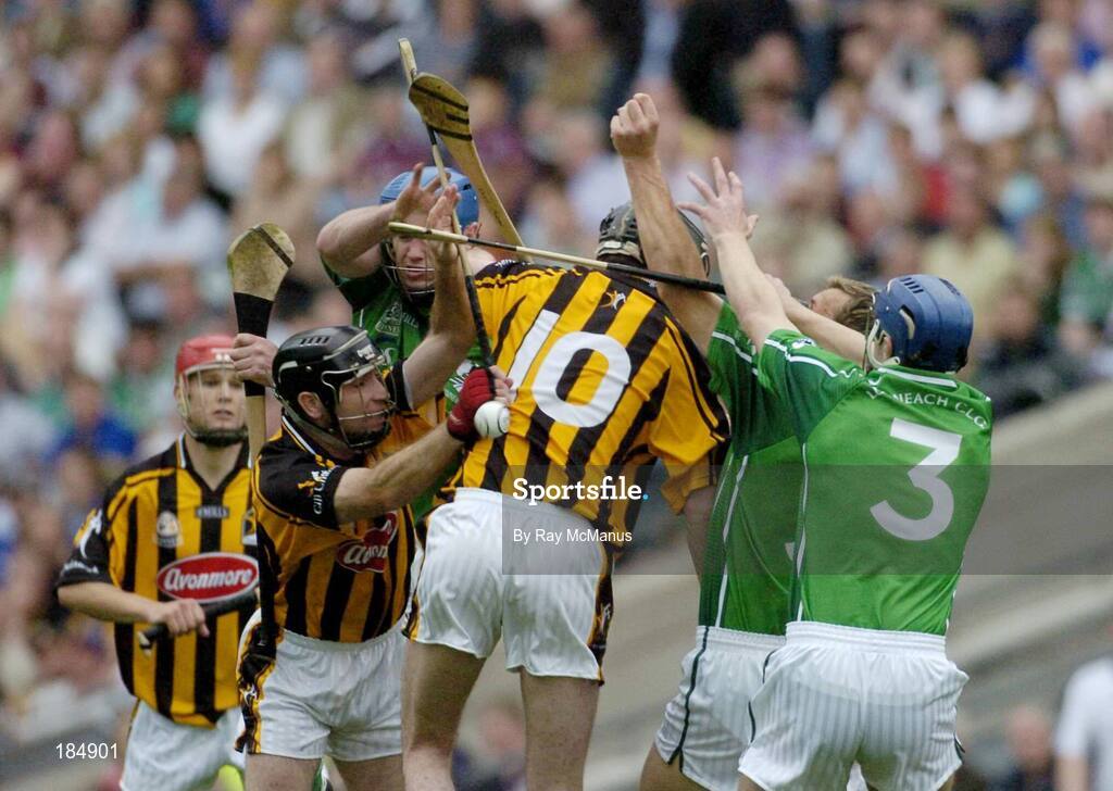 31 July 2005; Players from both sides including DJ Carey, Martin Comerford, 10, Kilkenny, Brian Geary, Ollie Moran and Stephen Lucey, 3, Limerick. Guinness All-Ireland Senior Hurling Championship Quarter-Final, Kilkenny v Limerick, Croke Park, Dublin. Picture credit; Ray McManus / SPORTSFILE
