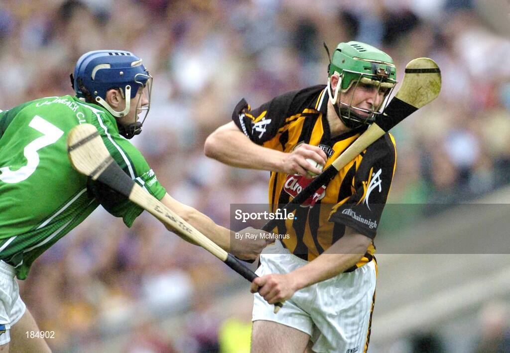 31 July 2005; Eoin Larkin, Kilkenny, is tackled by Stephen Lucey, Limerick. Guinness All-Ireland Senior Hurling Championship Quarter-Final, Kilkenny v Limerick, Croke Park, Dublin. Picture credit; Ray McManus / SPORTSFILE