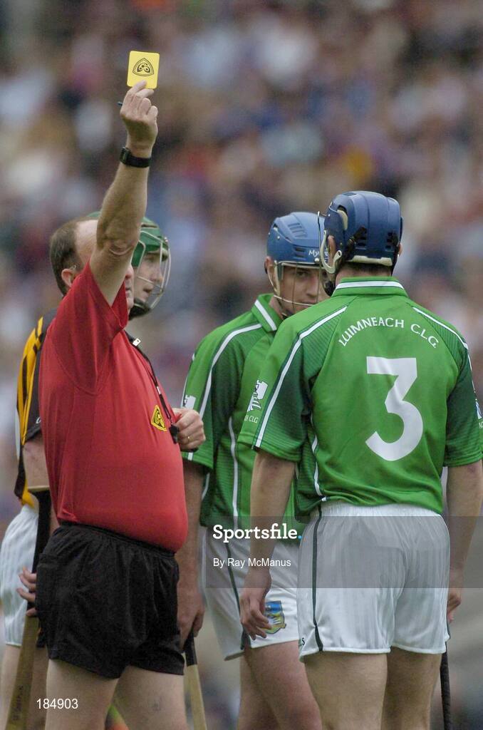 31 July 2005; Stephen Lucey, 3, Limerick, is booked by referee Ger Harrington. Guinness All-Ireland Senior Hurling Championship Quarter-Final, Kilkenny v Limerick, Croke Park, Dublin. Picture credit; Ray McManus / SPORTSFILE