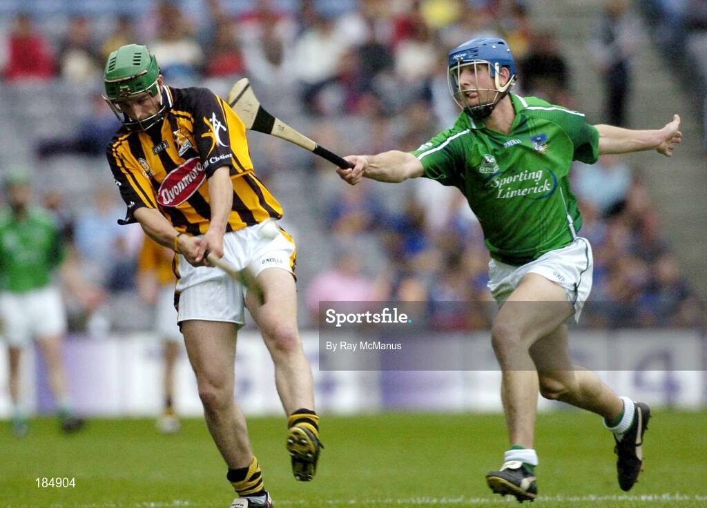 31 July 2005; Richard Mullally, Kilkenny, is tackled by James O'Brien, Limerick. Guinness All-Ireland Senior Hurling Championship Quarter-Final, Kilkenny v Limerick, Croke Park, Dublin. Picture credit; Ray McManus / SPORTSFILE