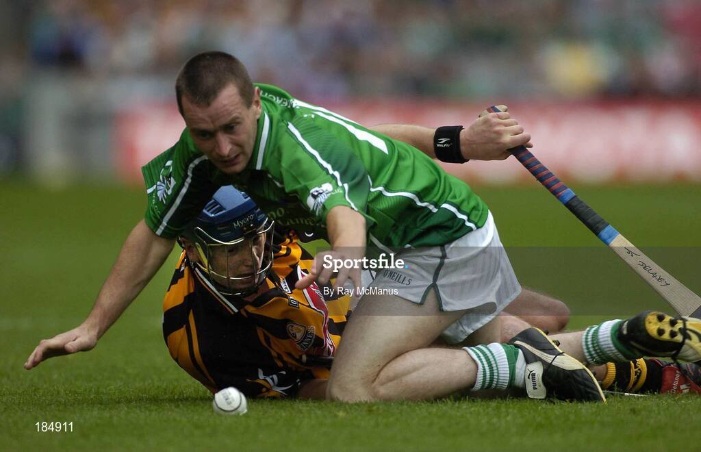 31 July 2005; Donie Ryan, Limerick, is tackled by J.J. Delaney, Kilkenny. Guinness All-Ireland Senior Hurling Championship Quarter-Final, Kilkenny v Limerick, Croke Park, Dublin. Picture credit; Ray McManus / SPORTSFILE