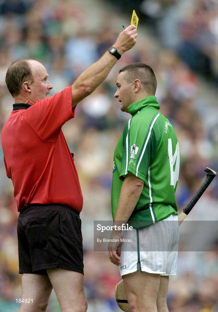 31 July 2005; TJ Ryan, Limerick, is shown a yellow card by referee Ger Harrington. Guinness All-Ireland Hurling Championship, Quarter-Final, Kilkenny v Limerick, Croke Park, Dublin. Picture credit; Brendan Moran / SPORTSFILE