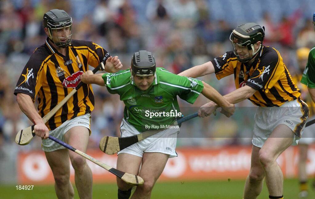 31 July 2005; TJ Ryan, Limerick, is tackled by John Tennyson and Peter Barry, Kilkenny. Guinness All-Ireland Senior Hurling Championship Quarter-Final, Kilkenny v Limerick, Croke Park, Dublin. Picture credit; Ray McManus / SPORTSFILE