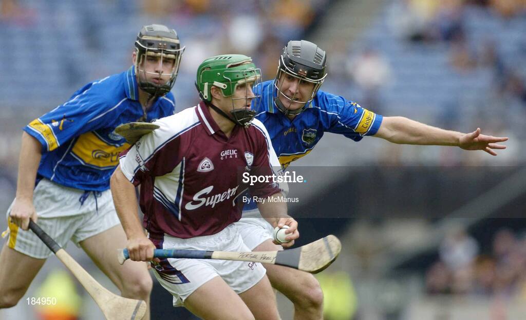 31 July 2005; Fergal Healy, Galway, is tackled by Eddie Enright, Tipperary. Guinness All-Ireland Senior Hurling Championship Quarter-Final, Galway v Tipperary, Croke Park, Dublin. Picture credit; Ray McManus / SPORTSFILE