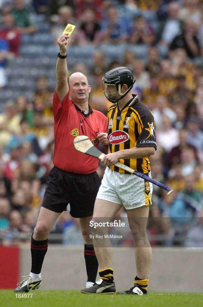 31 July 2005; John Tennyson, Kilkenny, is shown the yellow card by referee Ger Harrington. Guinness All-Ireland Senior Hurling Championship Quarter-Final, Kilkenny v Limerick, Croke Park, Dublin. Picture credit; Ray McManus / SPORTSFILE