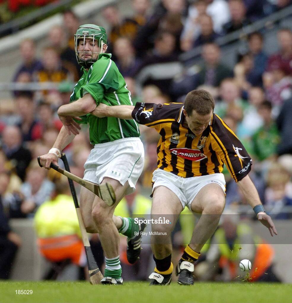 31 July 2005; Michael Kavanagh, Kilkenny, is tackled by Andrew O'Shaughnessy, Limerick. Guinness All-Ireland Senior Hurling Championship Quarter-Final, Kilkenny v Limerick, Croke Park, Dublin. Picture credit; Ray McManus / SPORTSFILE