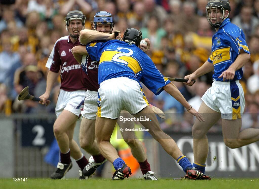 31 July 2005; Damien Hayes, Galway, holds off the challenge of Hugh Moloney, Tipperary, on his way to scoring his sides second goal. Guinness All Ireland Hurling Championship, Quarter Final, Galway v Tipperary, Croke Park, Dublin. Picture credit; Brendan Moran / SPORTSFILE