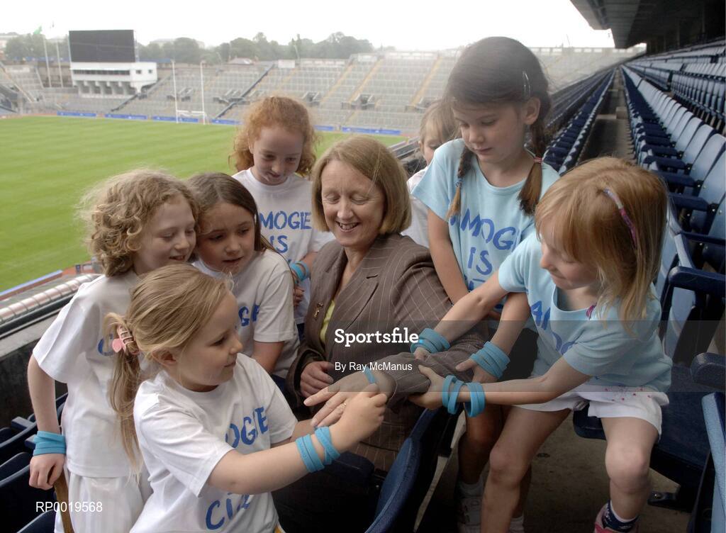 2 August 2005; The All-Ireland Minor A & B Camogie Finals, Kilkenny v Tipperary and Offaly v Armagh, will take place in Parnell Park, Dublin, on Sunday 7th August 2005. Pictured at a photocall to introduce the captains are Miriam O’Callaghan, Uachtarán, Cumann Camógaíochta na nGael and camogie stars of the future, l to r, Zoe Murray, Moya Caulfield, Aoife Nic Con Iomaire, Emily Lacey, Meadhbh Ní Dhálaigh, Clara O’Sullivan and  Leah Divine, who were on hand to launch “Camogie is Cúl” wristbands which are being distributed through Camogie and Hurling camps. Croke Park, Dublin. Picture credit; Ray McManus / SPORTSFILE