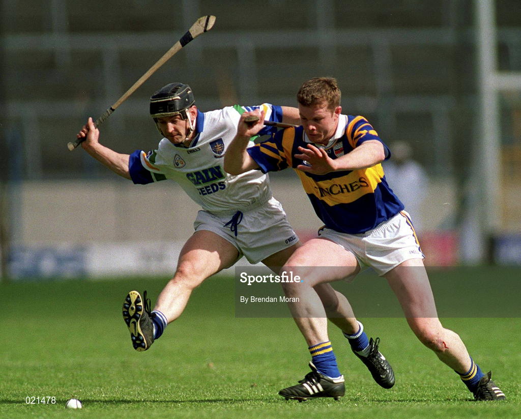 18 April 1999; Billy O'Sullivan of Waterford in action against Conor Gleeson of Tipperary during the Church and General National Hurling League Division 1B match between Tipperary and Waterford at Semple Stadium in Thurles, Tipperary. Photo by Brendan Moran/Sportsfile