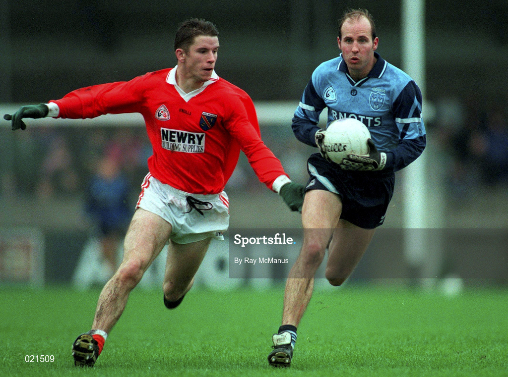 27 October 1996; Brian Stynes of Dublin in action against Paul McGrane of Armagh during the Church & General National Football League Division 2 match between Dublin and Armagh at Parnell Park in Dublin. Photo by Ray McManus/Sportsfile