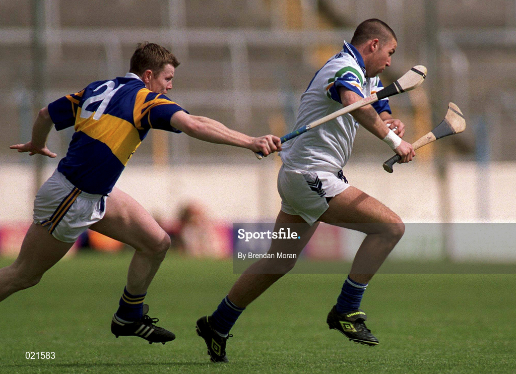 18 April 1999; Dan Shanahan of Waterford in action against Conor Gleeson of Tipperary during the Church and General National Hurling League Division 1B match between Tipperary and Waterford at Semple Stadium in Thurles, Tipperary. Photo by Brendan Moran/Sportsfile