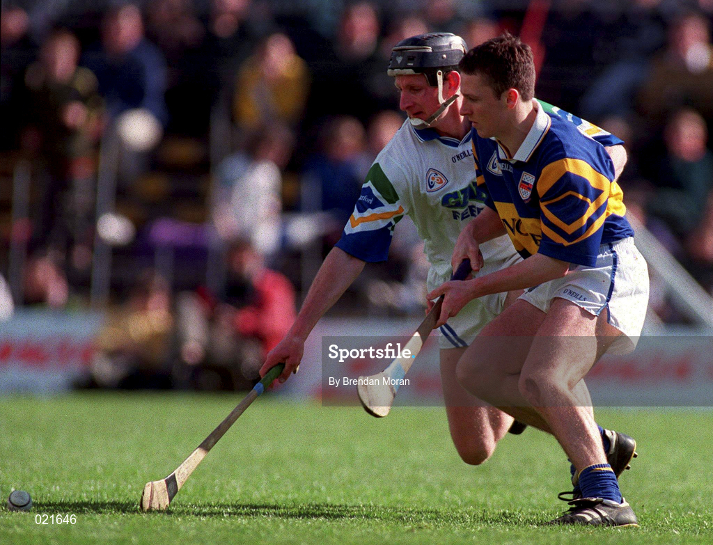 18 April 1999; Sean Cullinane of Waterford in action against Declan Browne of Tipperary during the Church and General National Hurling League Division 1B match between Tipperary and Waterford at Semple Stadium in Thurles, Tipperary. Photo by Brendan Moran/Sportsfile