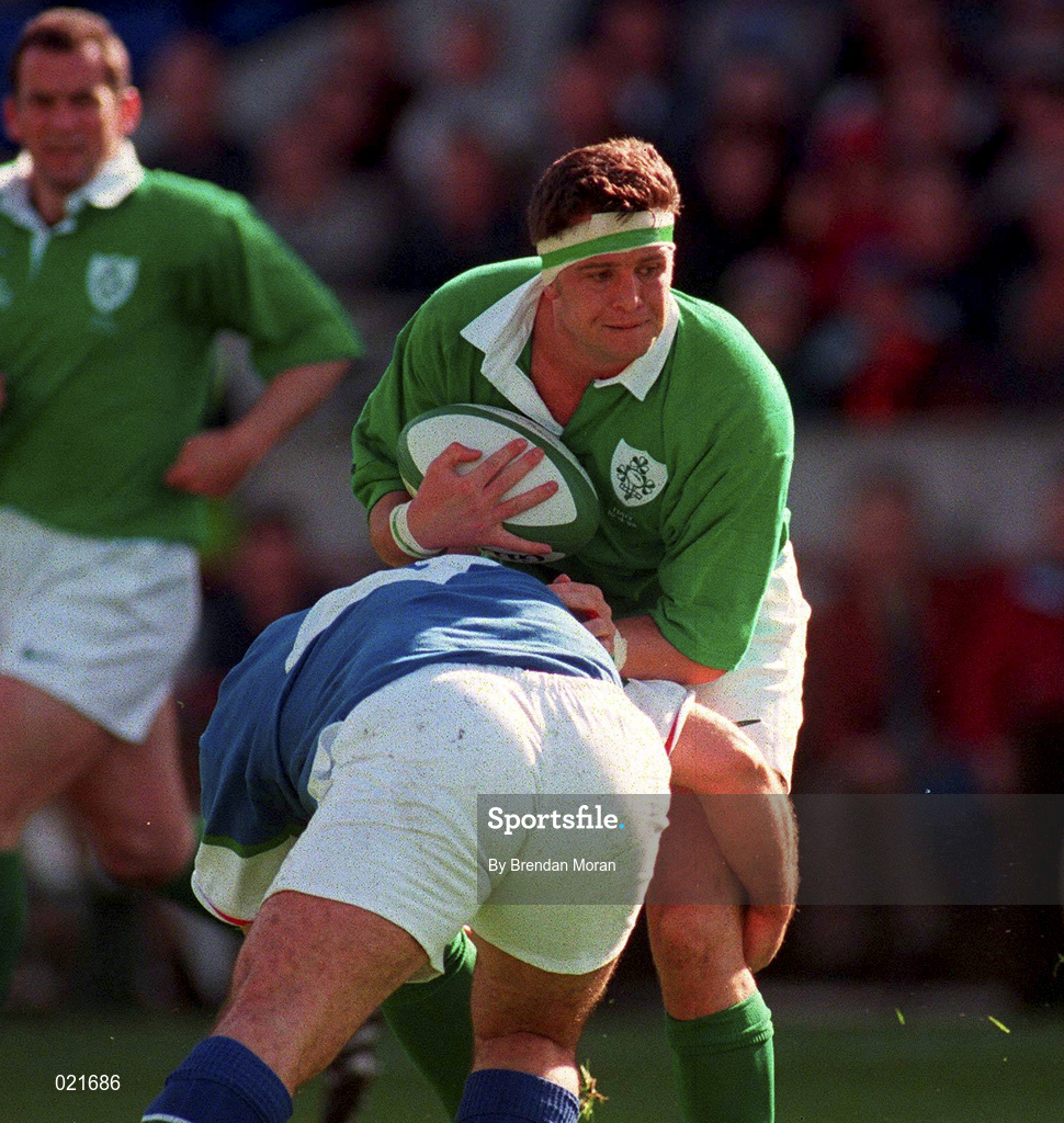 10 April 1999; Dion O'Cuinneagain of Ireland is tackled by Gianpiero De Carli of Italy during the Rugby International match between Ireland and Italy at Lansdowne Road in Dublin. Photo by Brendan Moran/Sportsfile