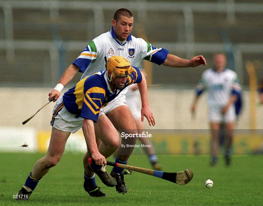 18 April 1999; Eamon Corcoran of Tipperary in action against Dan Shanahan of Waterford during the Church and General National Hurling League Division 1B match between Tipperary and Waterford at Semple Stadium in Thurles, Tipperary. Photo by Brendan Moran/Sportsfile