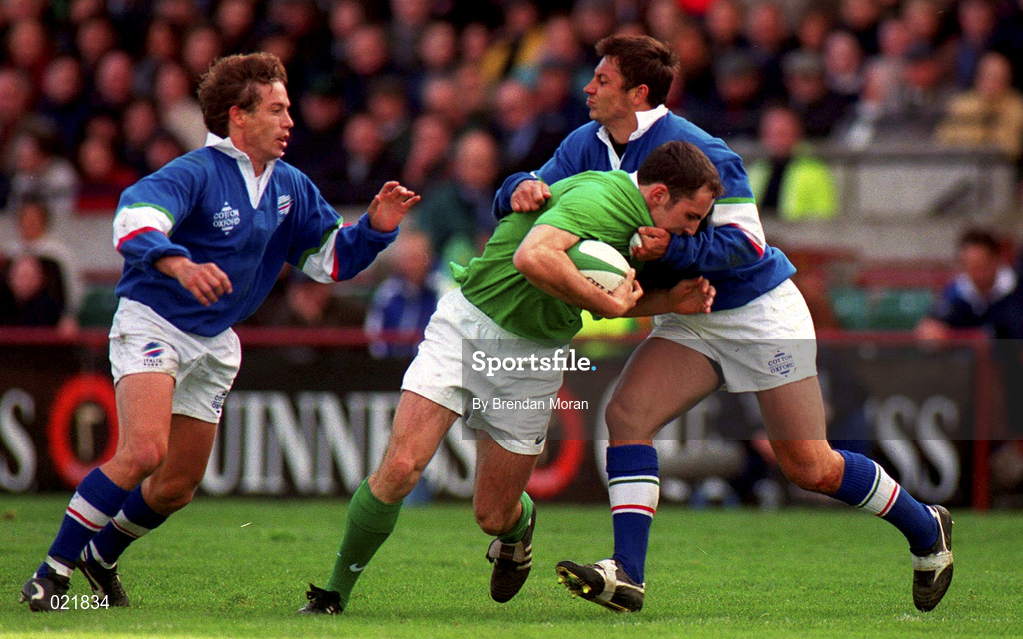 10 April 1999; Girvan Dempsey of Ireland is tackled by Diego Dominguez, left, and Luca Martin of Italy during the Rugby International match between Ireland and Italy at Lansdowne Road in Dublin. Photo by Brendan Moran/Sportsfile