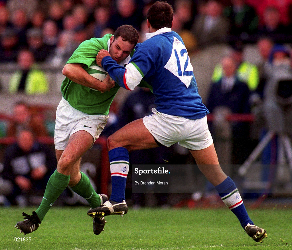 10 April 1999; Girvan Dempsey is tackled by Luca Martin of Italy during the Rugby International match between Ireland and Italy at Lansdowne Road in Dublin. Photo by Brendan Moran/Sportsfile