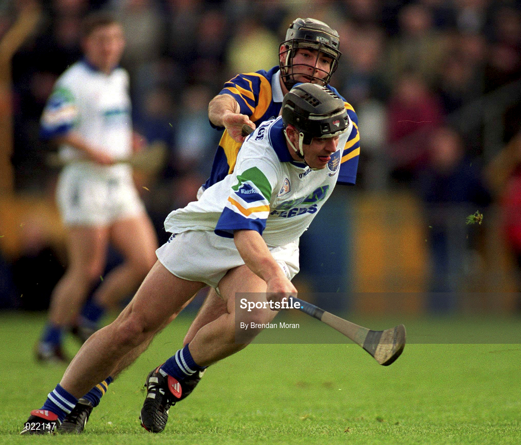 18 April 1999; Paul Flynn of Waterford in action against Donncha Fahy of Tipperary during the Church and General National Hurling League Division 1B match between Tipperary and Waterford at Semple Stadium in Thurles, Tipperary. Photo by Brendan Moran/Sportsfile