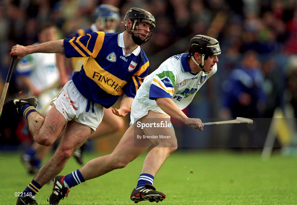 18 April 1999; Paul Flynn of Waterford in action against Donncha Fahy of Tipperary during the Church and General National Hurling League Division 1B match between Tipperary and Waterford at Semple Stadium in Thurles, Tipperary. Photo by Brendan Moran/Sportsfile
