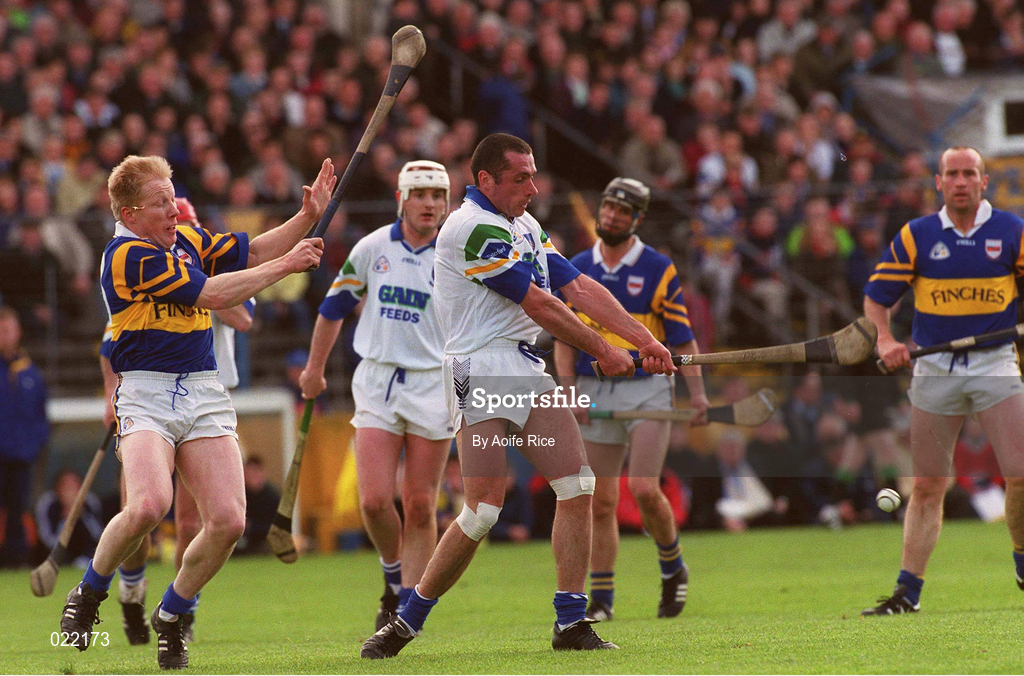 18 April 1999; Peter Queally of Waterford in action against Aidan Ryan of Tipperary during the Church and General National Hurling League Division 1B match between Tipperary and Waterford at Semple Stadium in Thurles, Tipperary. Photo by Aoife Rice/Sportsfile