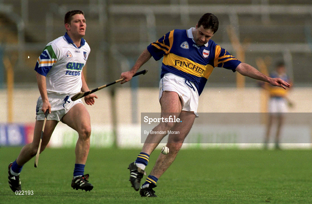 18 April 1999; Raymie Ryan of Tipperary in action against Ken McGrath of Waterford during the Church and General National Hurling League Division 1B match between Tipperary and Waterford at Semple Stadium in Thurles, Tipperary. Photo by Brendan Moran/Sportsfile