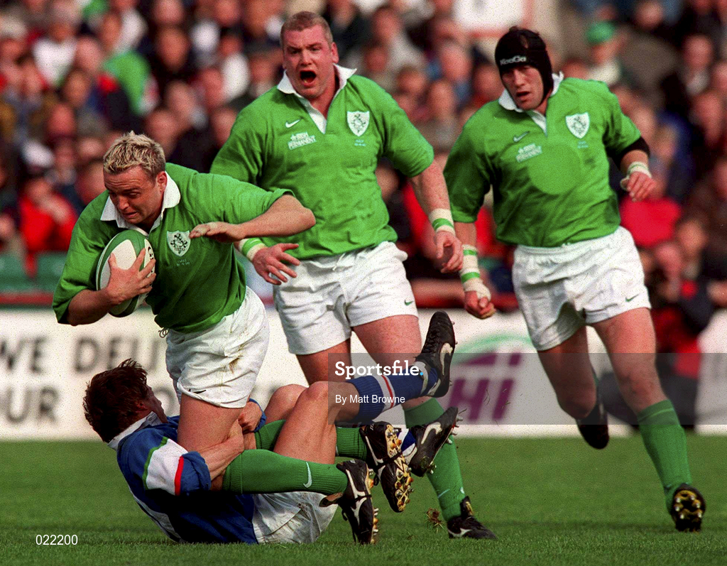 10 April 1999; Rob Henderson of Ireland is tackled by Diego Dominguez of Italy during the Rugby International match between Ireland and Italy at Lansdowne Road in Dublin. Photo by Matt Browne/Sportsfile