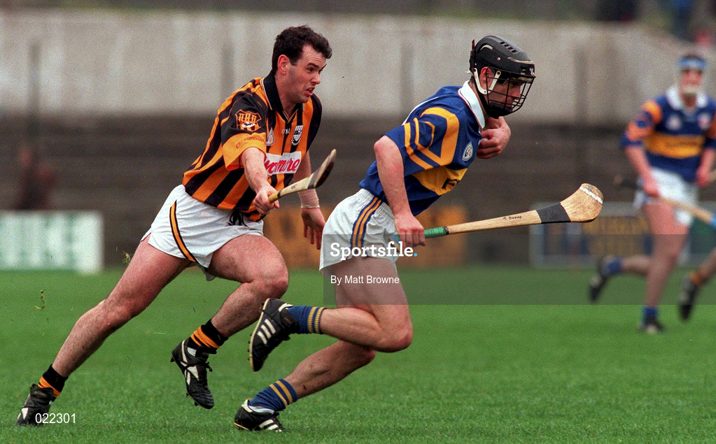 28 March 1999; Thomas Dunne of Tipperary in action against Brian McEvoy of Kilkenny during the Church and General National Hurling League Division 1B match between Kilkenny and Tipperary at Nowlan Park in Kilkenny. Photo by Matt Browne/Sportsfile