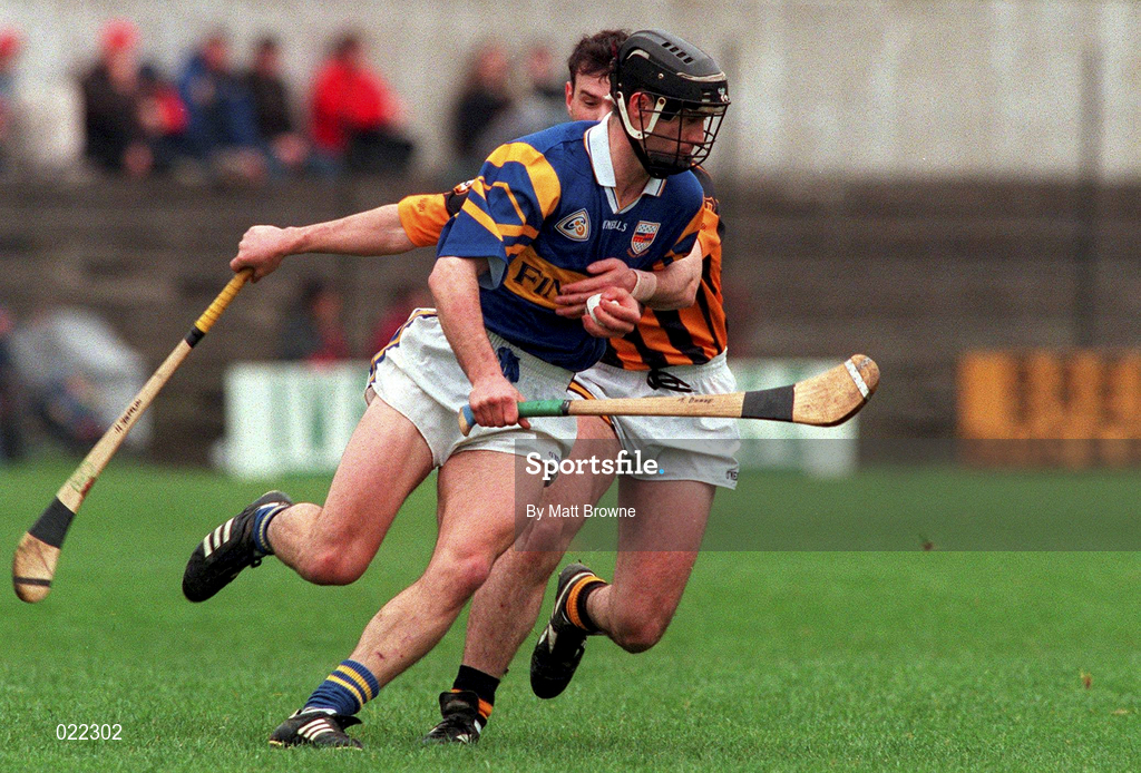 28 March 1999; Thomas Dunne of Tipperary in action against Brian McEvoy of Kilkenny during the Church and General National Hurling League Division 1B match between Kilkenny and Tipperary at Nowlan Park in Kilkenny. Photo by Matt Browne/Sportsfile