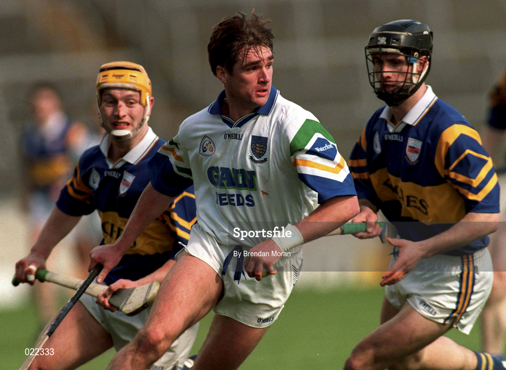 18 April 1999; Tony Browne of Waterford in action against Liam Cahill, left, and Thomas Dunne of Tipperary during the Church and General National Hurling League Division 1B match between Tipperary and Waterford at Semple Stadium in Thurles, Tipperary. Photo by Brendan Moran/Sportsfile