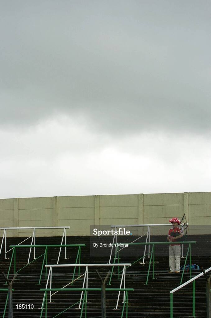 30 July 2005; Pa Hurley, from Mayfield, Cork, plays his bagpipes before the game. Bank of Ireland Football Championship qualifiers, Round 4. Cork v Sligo, O'Moore Park, Portlaoise, Co. Laois. Picture credit; Brendan Moran / SPORTSFILE