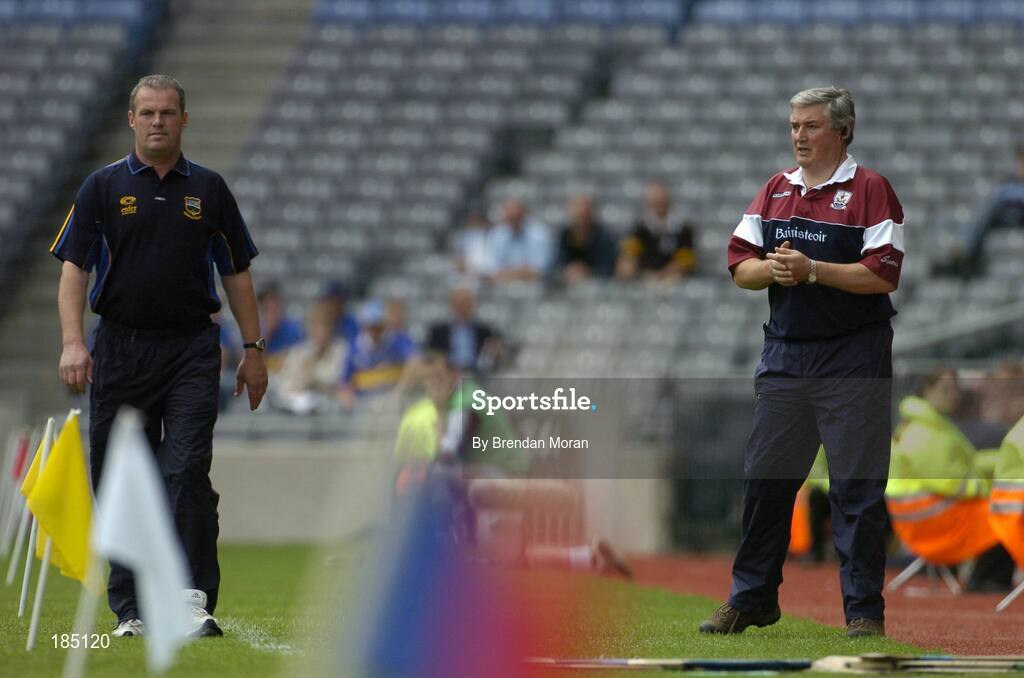 31 July 2005; Tipperary manager Ken Hogan passes by Galway manager Conor Hayes during the game. Guinness All-Ireland Hurling Championship, Quarter-Final, Galway v Tipperary, Croke Park, Dublin. Picture credit; Brendan Moran / SPORTSFILE