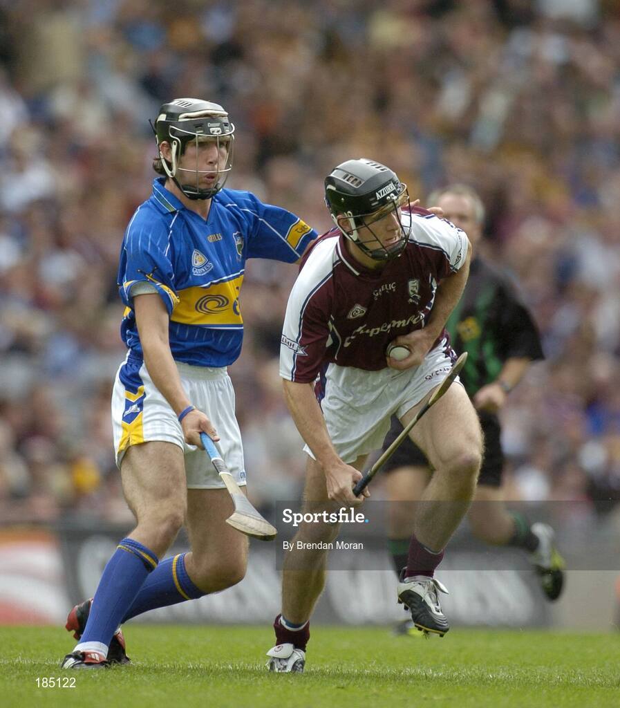31 July 2005; Tony Og Regan, Galway, in action against John Devane, Tipperary. Guinness All-Ireland Hurling Championship, Quarter-Final, Galway v Tipperary, Croke Park, Dublin. Picture credit; Brendan Moran / SPORTSFILE