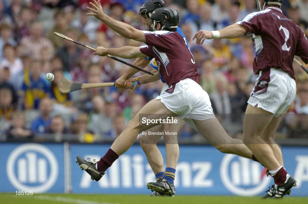31 July 2005; Tommy Dunne, Tipperary, scores his sides first goal despite the attentions of Shane Kavanagh and Damien Joyce (2), Galway. Guinness All-Ireland Hurling Championship, Quarter-Final, Galway v Tipperary, Croke Park, Dublin. Picture credit; Brendan Moran / SPORTSFILE