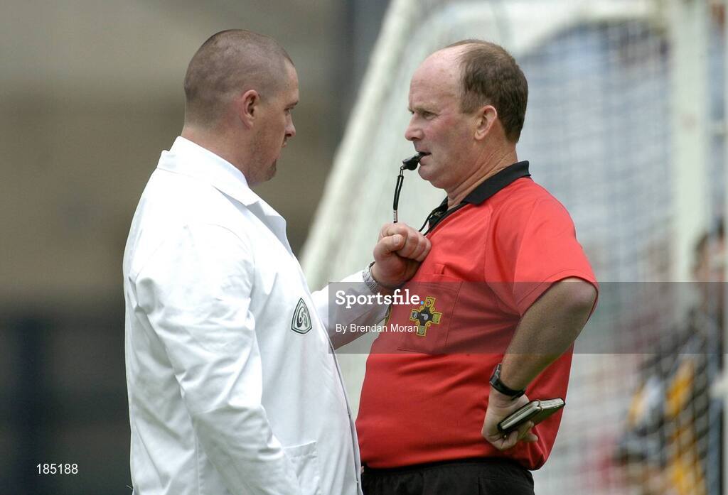 31 July 2005; Referee Ger Harrington speaks to one of his umpires about an off the ball incident during the game. Guinness All-Ireland Hurling Championship, Quarter-Final, Kilkenny v Limerick, Croke Park, Dublin. Picture credit; Brendan Moran / SPORTSFILE