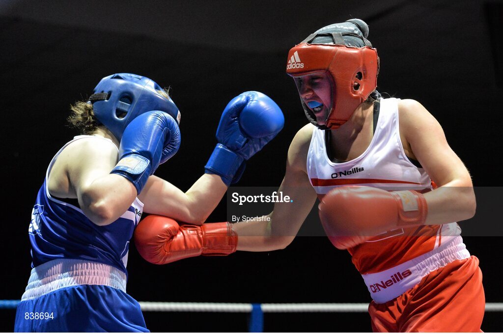 1 March 2014; Joanna Barclay, right, Holy Family Boxing Club, exchanges punches with Claire Grace, Callan Boxing Club, during their 69 kg bout. National Senior Boxing Championships Semi Finals, National Stadium, Dublin. Photo by Sportsfile
