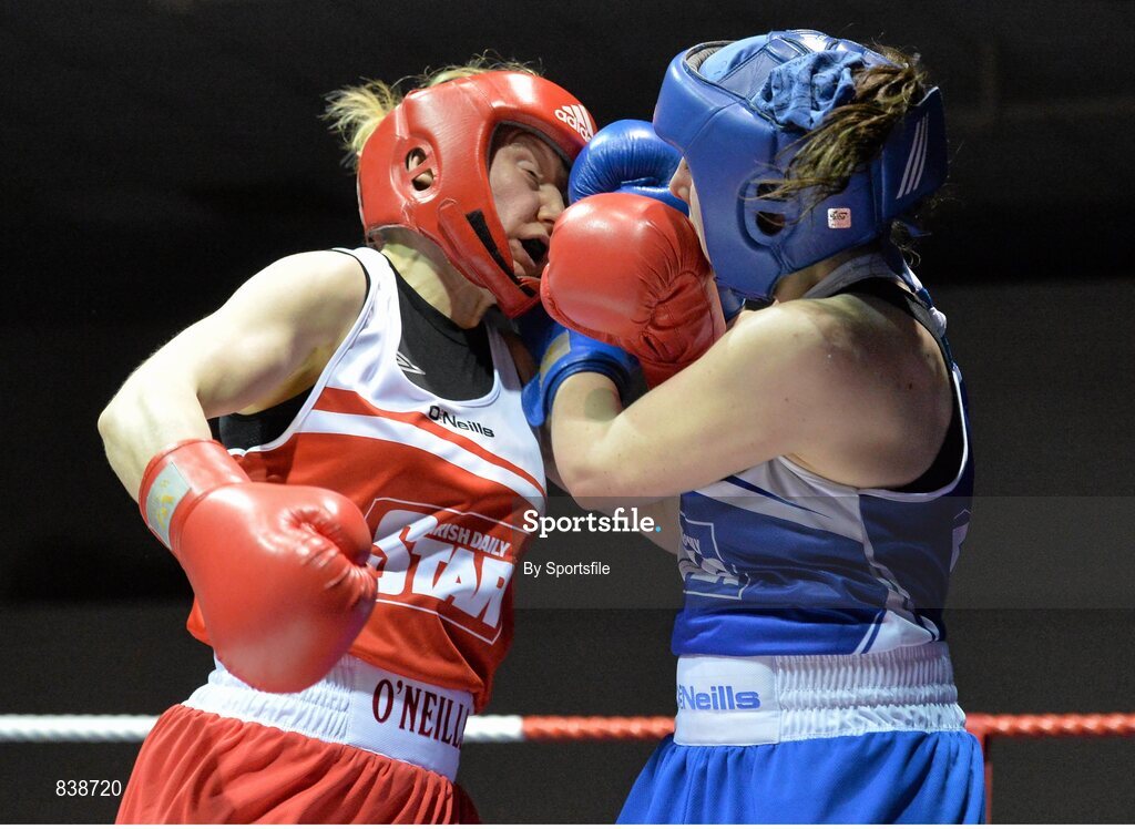 1 March 2014; Aoife Hennigan, right, Swinford Boxing Club, exchanges punches with Laoise Traynor, Bray Boxing Club, during their 69 kg bout. National Senior Boxing Championships Semi-Finals, National Stadium, Dublin. Photo by Sportsfile