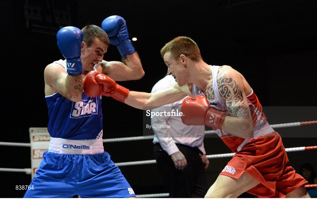 1 March 2014; Stephen Donnelly, right, All Saints Boxing Club, exchanges punches with, John Joe Joyce, St Michael’s Athy Boxing Club, during their 69 kg bout. National Senior Boxing Championships Semi-Finals, National Stadium, Dublin. Photo by Sportsfile