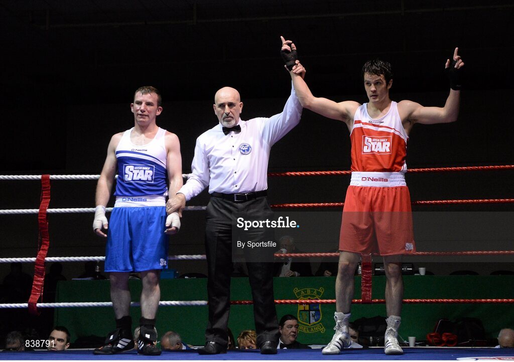 1 March 2014; Darren O'Neill, right, Paulstown Boxing Club, is declared the winner over Derek Duhig, St. Francis Boxing Club, following their 75 kg bout. National Senior Boxing Championships Semi Finals, National Stadium, Dublin. Photo by Sportsfile