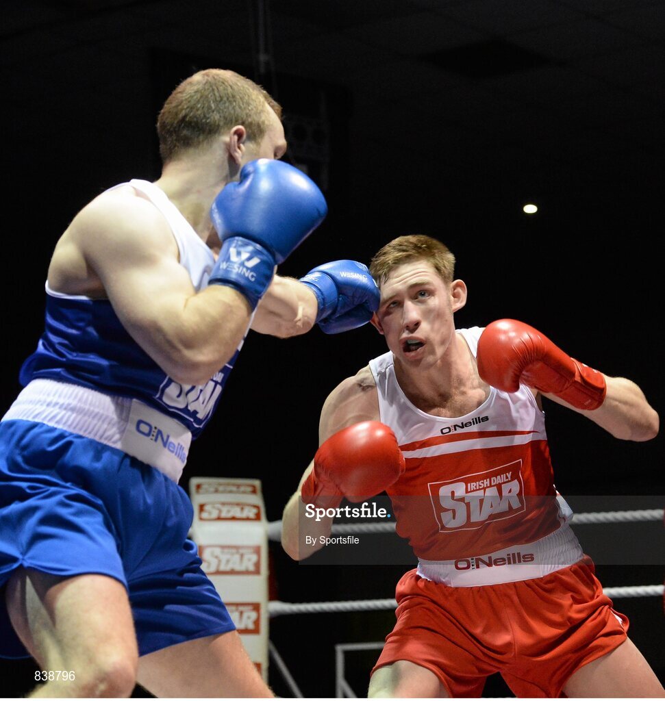 1 March 2014; Donal Ward, left, Loughglynn Boxing Club, exchanges punches with Matthew Tinker, St Francis Boxing Club, during their 81 kg bout. National Senior Boxing Championships Semi Finals, National Stadium, Dublin. Photo by Sportsfile