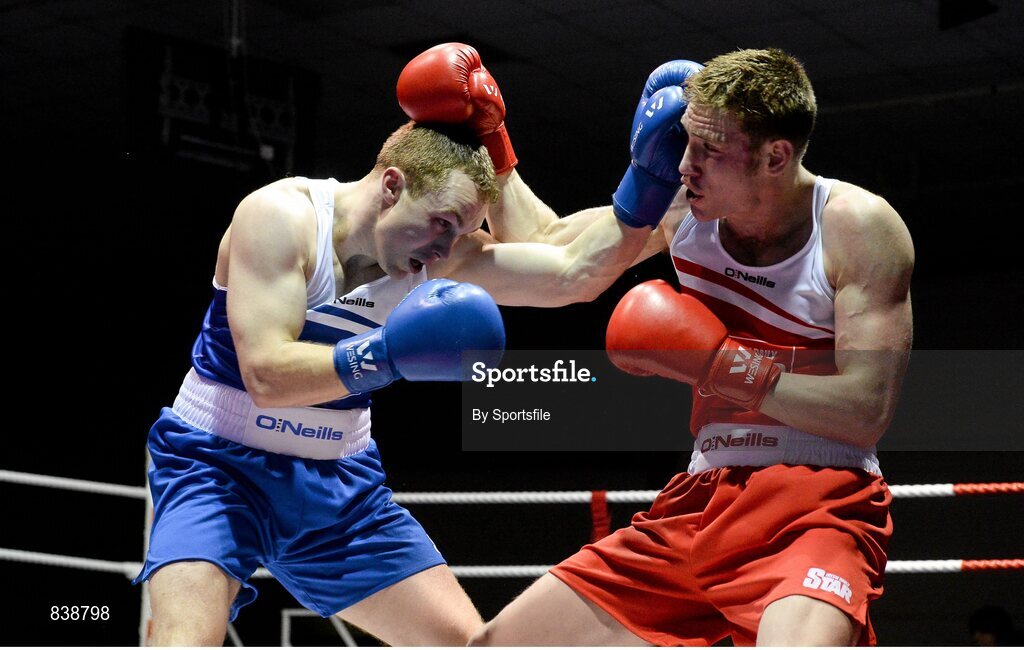 1 March 2014; Donal Ward, left, Loughglynn Boxing Club, exchanges punches with, Matthew Tinker St Francis Boxing Club, during their 81 kg bout. National Senior Boxing Championships Semi Finals, National Stadium, Dublin. Photo by Sportsfile